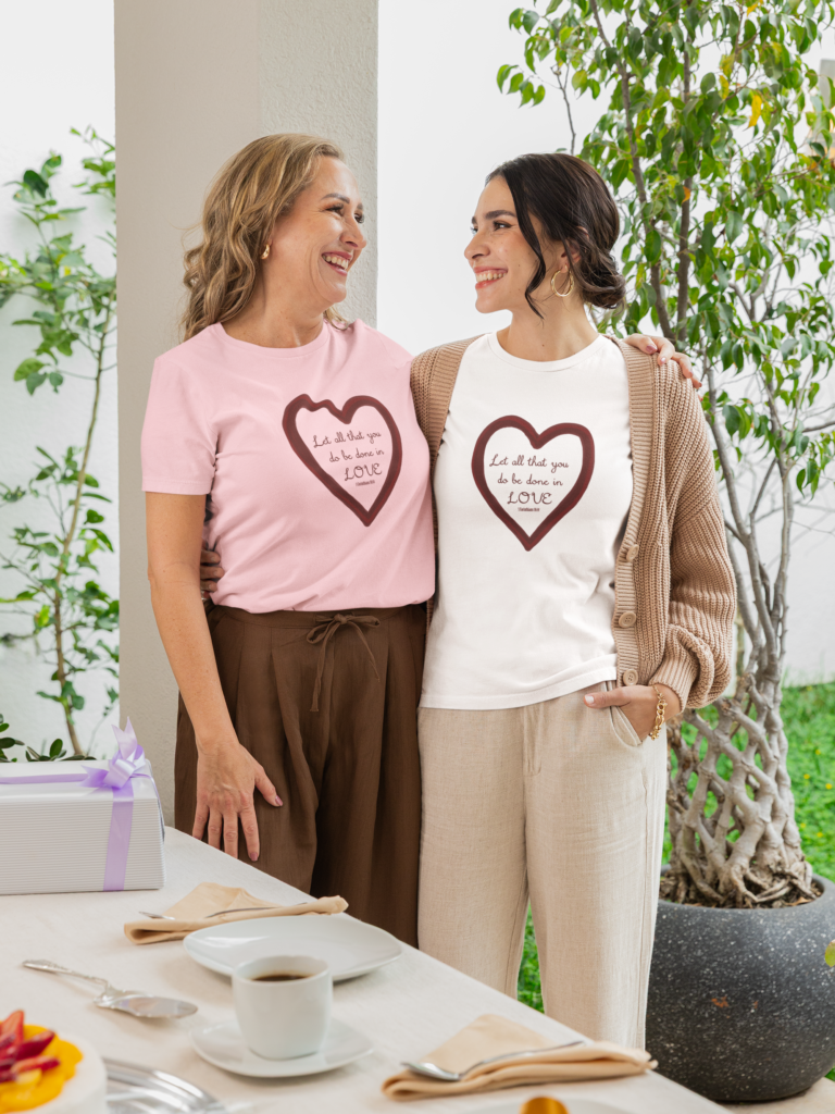 two women wearing matching love t-shirts